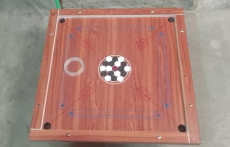 32"inches Carrom Board . Included coins , striker and pockets