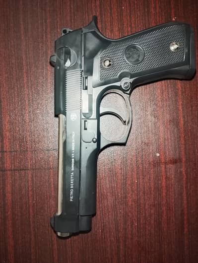 toy gun with steel coil