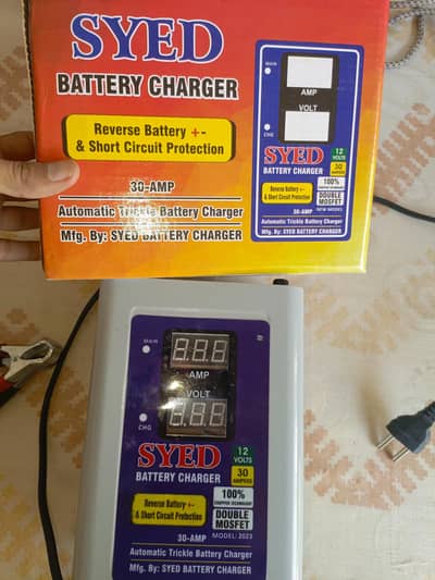 Automatic battery charger new with box urgent sale