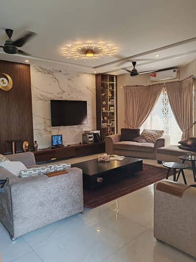 21 Marla Corner Slightly Used Ultra Modern Designer Owner Build Full Basement Fully Furnished Bungalow For Sale At Prime Location Of DHA Lahore Near To Park Masjid & Commercial Market.