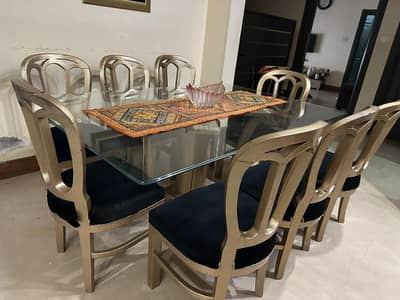 8 chairs dinning table with glass top
