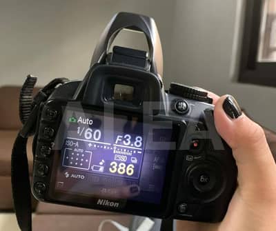 Nikon d 3100 with 200 mm lens