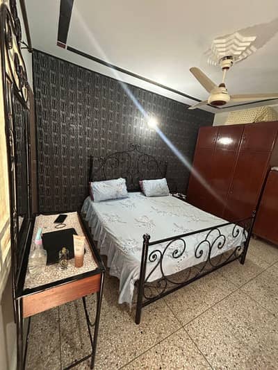 Iron bed with dressing and side tables for sale mattress not available