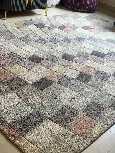 2 medium size carpets available for sale in a very good condition