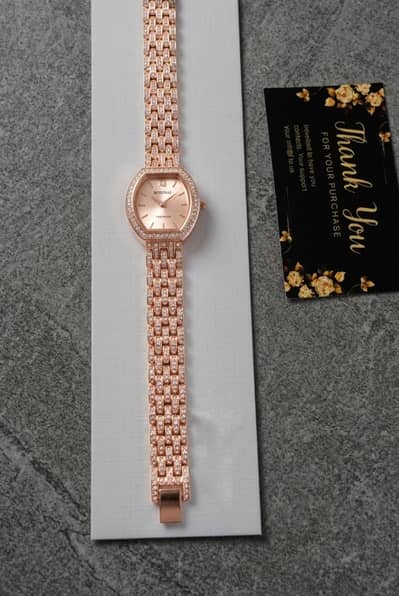 Rose Gold Diamond-Studded Bracelet Watch