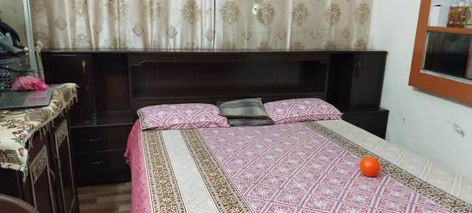 Pure Wooden use bed with attached side tables and 2 big bottom draws ,