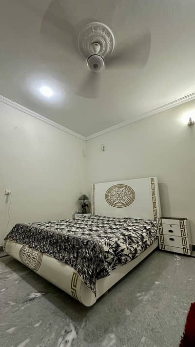 Double bed with two site tables for sale