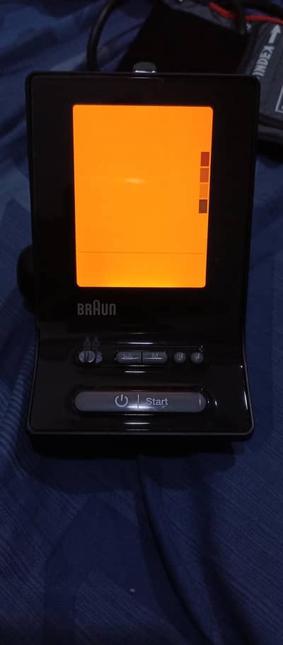 Braun Blood pressure device New  ( Brought from Germany)