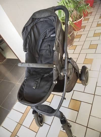 Graco® Evo® XT All Terrain with Rain Cover. Used .