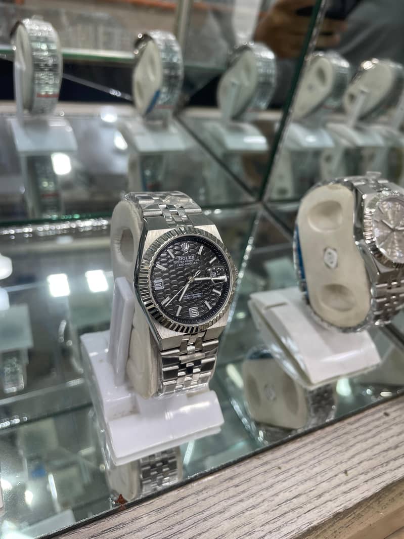Rolex Gucci 5