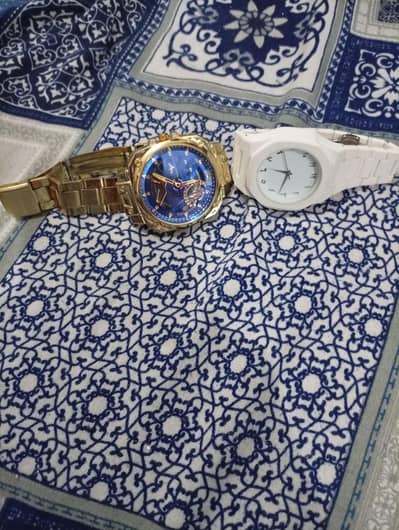Gold Blue Watch and Arabic Watch