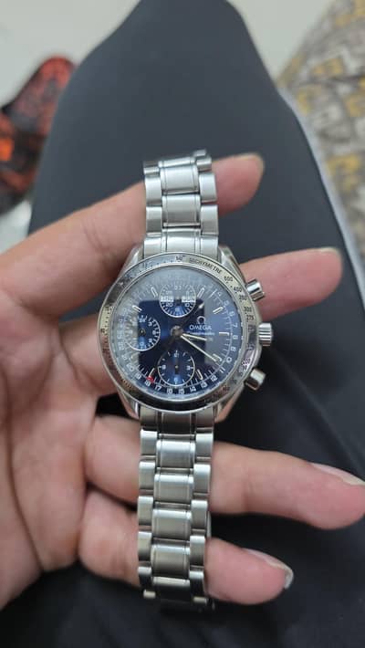 omega speedmaster triple date
