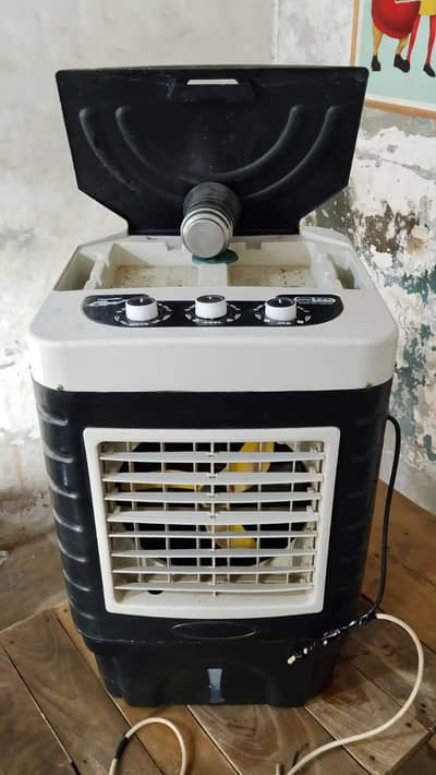 small DC cooler bilkul new condition m hai  03017401202