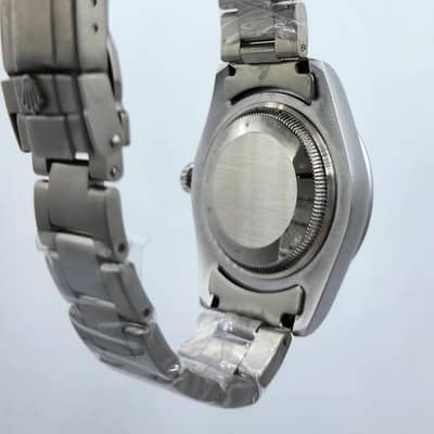 Stunning blue sunray Rolex watch with open Heart window
