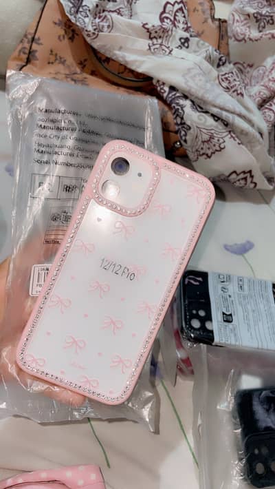 iphone 12 cover Transparent white and pink cover with stone work