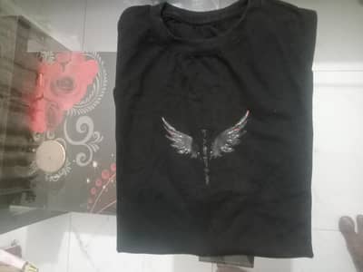 T shirt black  daraz se mag wahi ti achi quality