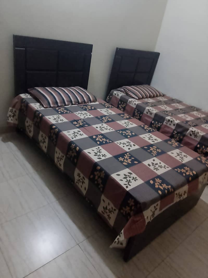 2 SINGLE BEDS 1