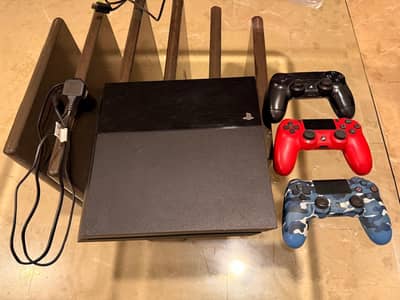 Sony PlayStation 4 with 3 conrollers