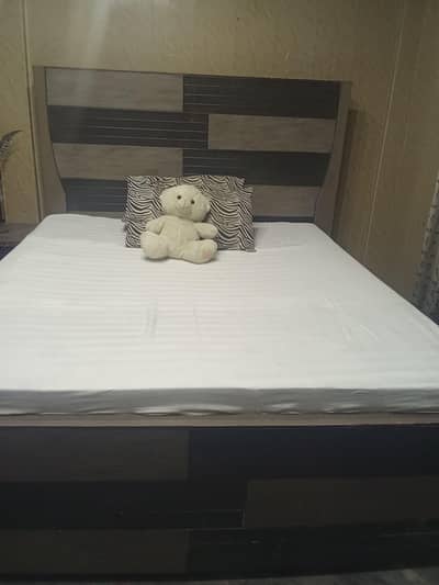 Bed with mattress,side tables and dressing table