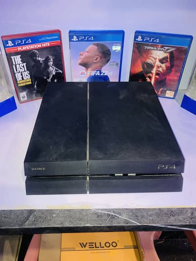Play station 4 with 3 games and 2 brand new controllers