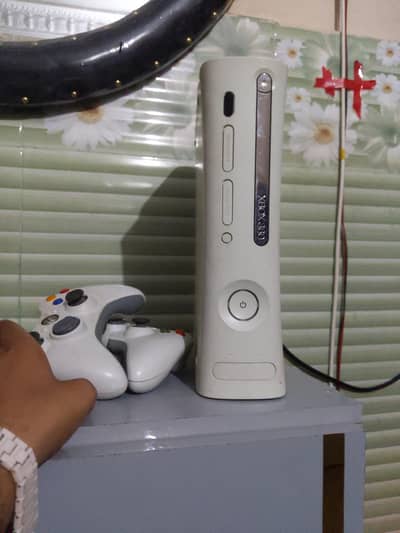Xbox 360 with 60 games installed 2 controllers