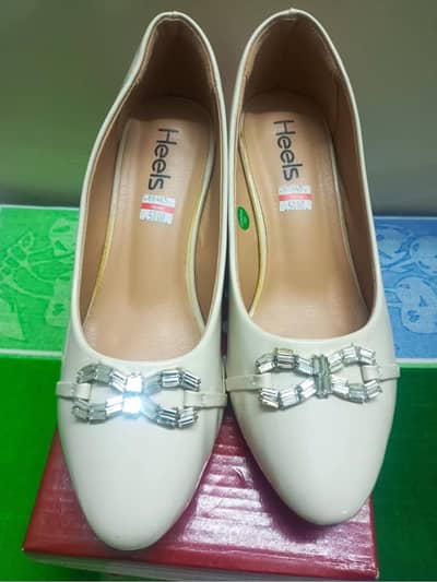 white branded coat shoes