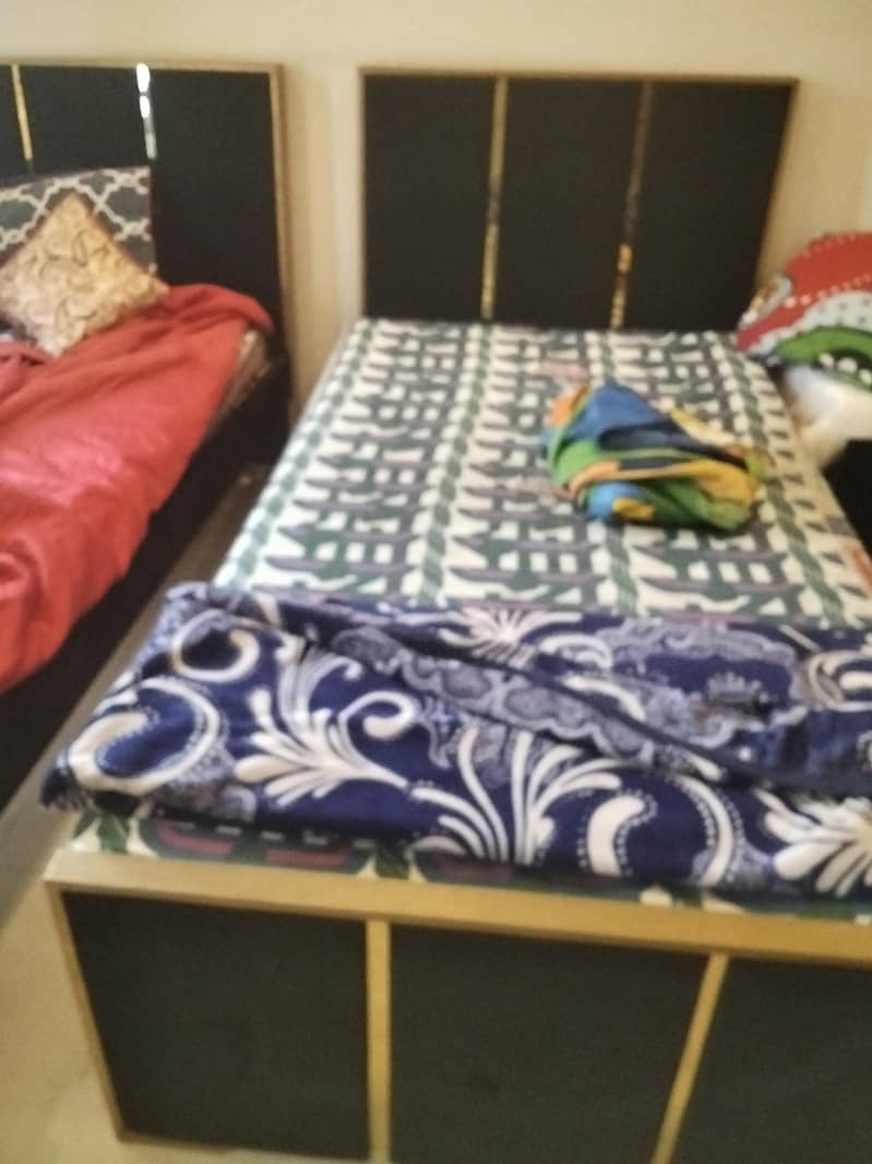 2 single bed with side table 1