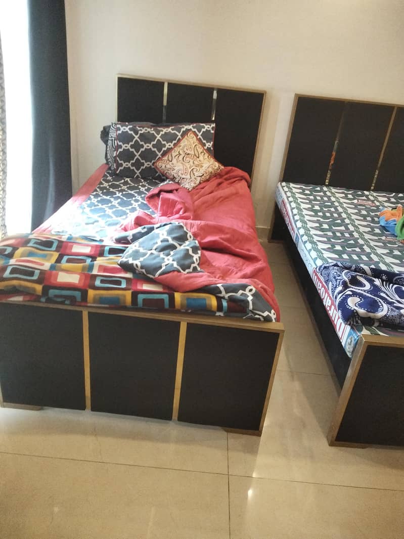2 single bed with side table 3