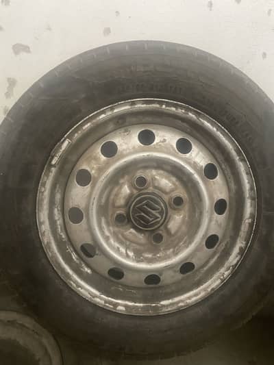 Alto original rims with tyres for sale urgent