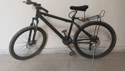 Good in Condition,black in colour , original metal,have 7 gears