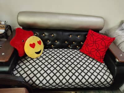 TWO SEATER SOFA IN GOOD CONDITION