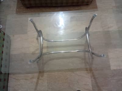 A glass  center table for sale