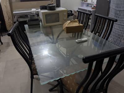 Iron Dining Table with glass top and 6 chairs
