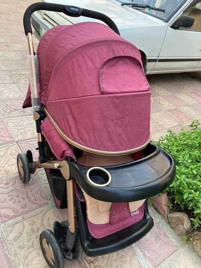 Beautiful kids pram / push chair