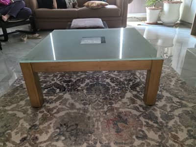 Stylish glass top centre table