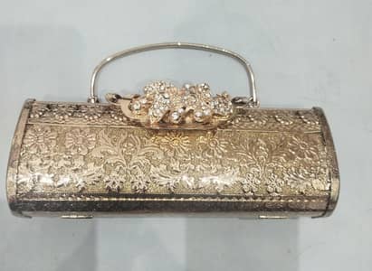 Gold Embossed Metal Clutch