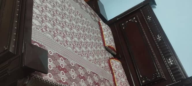 king size bed with dressing and side tables
