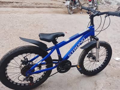 spot sycles company name strong blue couler