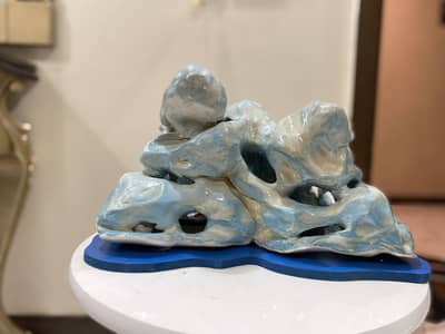 Ceramic sculpture with lamp