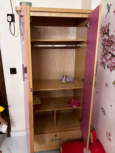 wood almari and bed