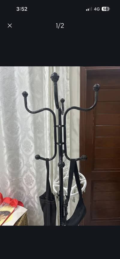 Iron coat stand