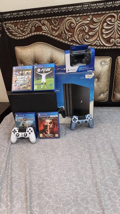 Ps4 pro 1tb jet black edition with 3 controllers and 4 games