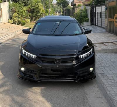 Civic top of line UG leathers+navigation 2017 modified fully