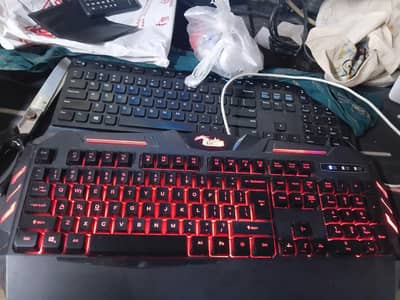 BAKTH 7 Colors LED Backlit Gaming Keyboard. negotiable