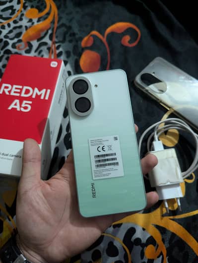 REDMI XIAOMI A5 - 4/128GB  IN WARRANTY COMPLETE BOX URGENT SALE