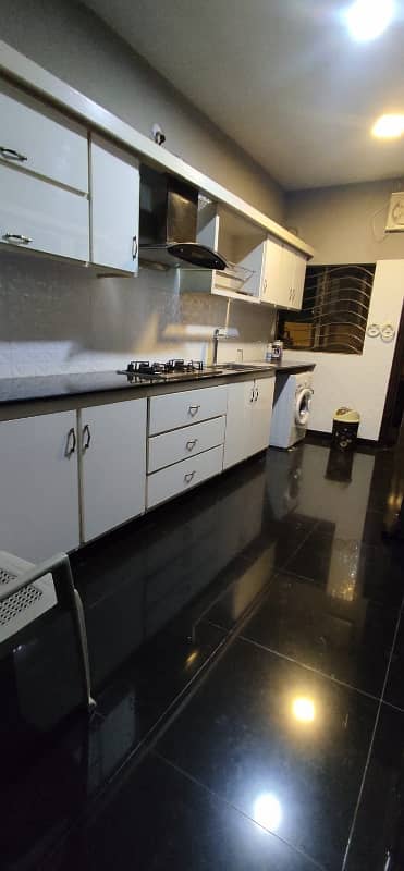 A beautiful house for rent ideal location All tile flooring front beautiful lawn