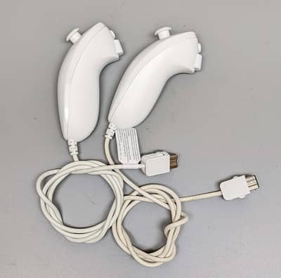 two sets of Nintendo Wii nunchuk