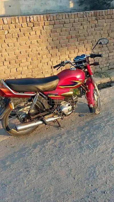 Yama 100cc comfortable bike in used condition visit only Sunday