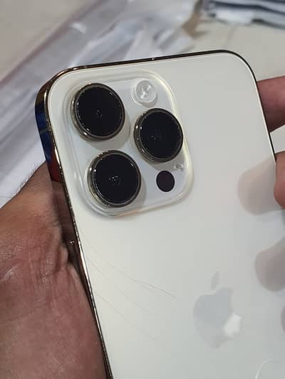Apple iPhone 14 Pro Max side line golden.        12 13 15 16