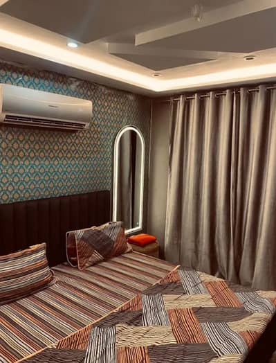 One bed vip apartment available on daily weakly basis in bahria town lahore and also available on short stay like 3/4 hours for couples and families